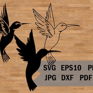 May include: Two black silhouette hummingbirds with wings outstretched. The hummingbird on the left is facing the right and the hummingbird on the right is facing the left. The hummingbirds are on a woodgrain background. The text "SVG EPS10 PNG JPG DXF PDF AI" is below the hummingbirds.