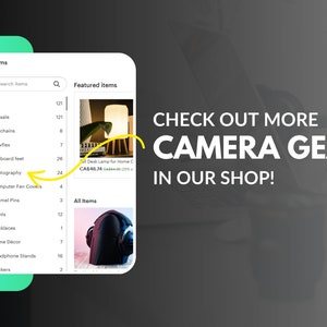 May include: A screenshot of a mobile app showing a list of items for sale, including photography equipment. The featured item is a desk lamp for home office use, priced at CA$48.74. The text "CHECK OUT MORE CAMERA GEAR IN OUR SHOP!" is displayed in large white letters.