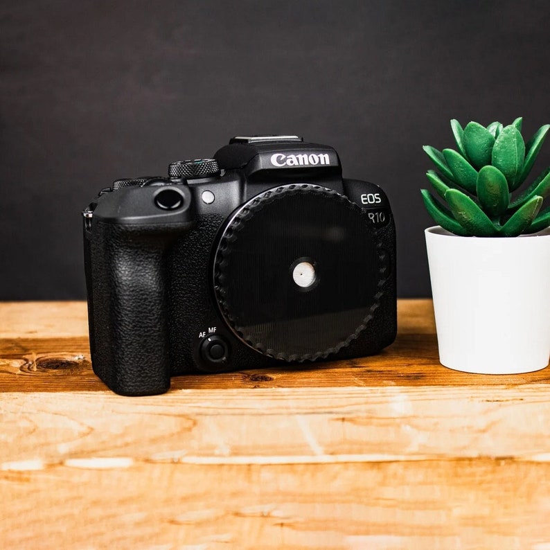 A canon pinhole lens compatible with RF mount camera.