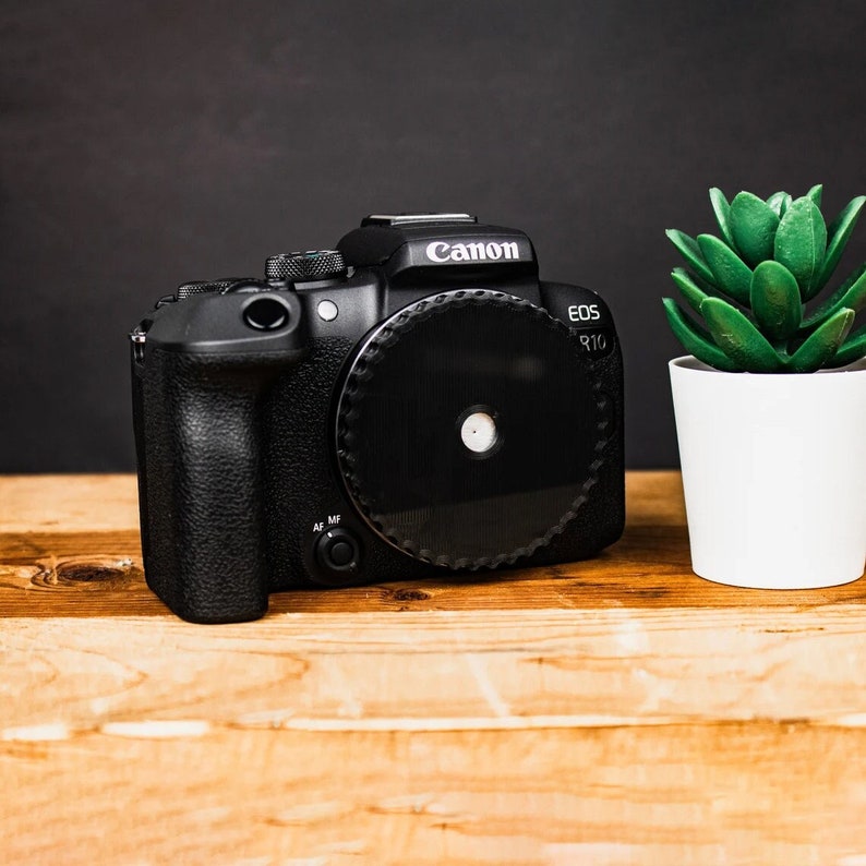 A canon pinhole lens compatible with RF mount camera.