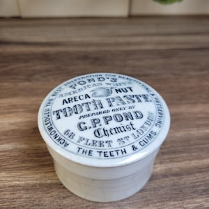 Antike Werbung Teiche Areca Nuss Zahnpasta Topf Deckel und Basis Chemiker Werbung weiße Keramik