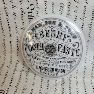 Antike Werbung Kirsch Zahnpasta Topf Deckel, bildhaftes Design, antike Apotheke, weißer Keramik