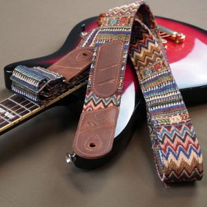 The Limited Edition Hippie pattern guitar strap leather ends and picks pockets for ukulele, acoustic, electric, bass guitar, fathers day gif
