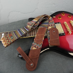 The Limited Edition Hippie pattern guitar strap leather ends and picks pockets for ukulele, acoustic, electric, bass guitar, made in Ukraine