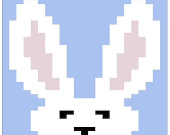 Patrón de manta de punto grueso con cara de conejito