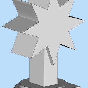 May include: A silver star-shaped award with a white base and a black plaque that reads "JOE GIZZO Luminary of the month JANUARY".