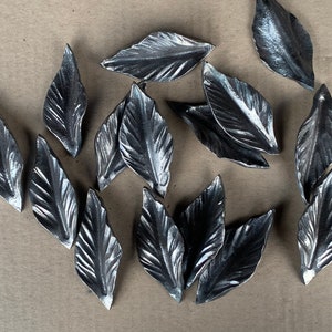 Set of 25 hand forged leaves. Forged elements. Blacksmith elements. Iron leaves. Metal leaves.