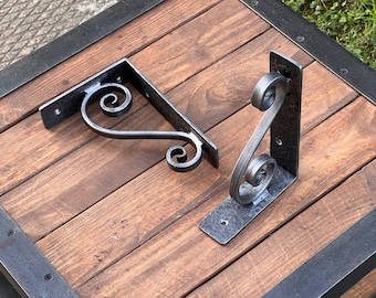 Wrought iron shelf bracket. Shelves storage. Storage organization.