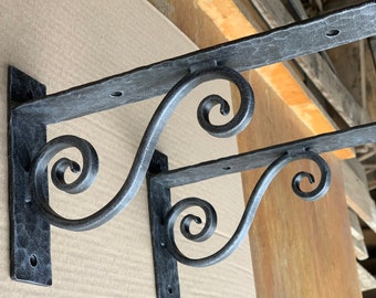 Hand forged metal shelf bracket. Shelf brackets. Corbels.