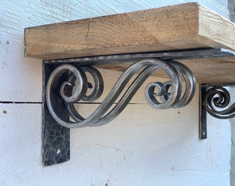 Hand forged metal shelf bracket. Shelves storage.