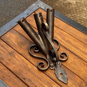 Triple wrought iron flag holder. Flag pole holder. wall flag holder. Three flags holder.