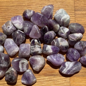Banded amethyst tumble stone