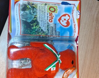 Oso de peluche TY Teenie Beanie Baby de McDonald's. Colección International Bears II, sin abrir, en su caja original.