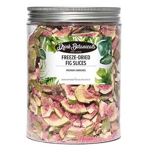 May include: A clear glass jar filled with freeze-dried fig slices. The jar has a silver lid and a white label that reads "Drink Botanicals Ireland Freeze-Dried Fig Slices Premium Garnishes www.drinkbotanicalsireland.ie".