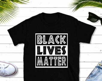 May include: Black t-shirt with the words "Black Lives Matter" printed in white on the front.