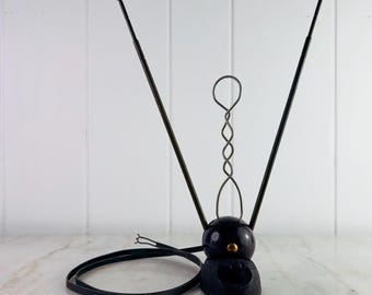 Vintage Indoor TV Antenna Rabbit Ears with Cast Iron Base Bakelite Dial Brass coloured metal extendable antenna 1950s untested