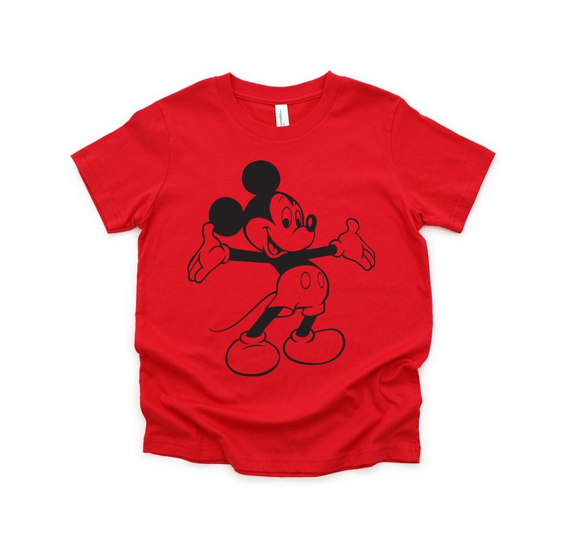May include: Red short-sleeved t-shirt with a black silhouette of Mickey Mouse in a playful pose.