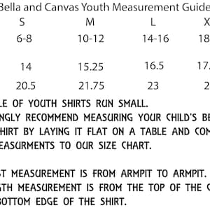 May include: Youth shirt size chart with measurements in inches for chest width and length. Sizes range from S (6-8) to XL (18-20).  The chart notes that this style of youth shirts run small and recommends measuring a child's best fitting shirt to compare.