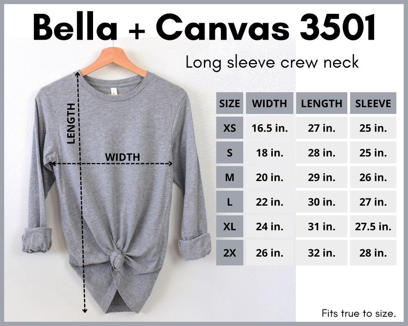 Pode incluir: Uma camiseta cinza de manga comprida e gola redonda com uma tabela de tamanhos que mostra as medidas em polegadas. A tabela inclui os tamanhos XS, S, M, L, XL e 2X. A camiseta &eacute; Bella + Canvas 3501.