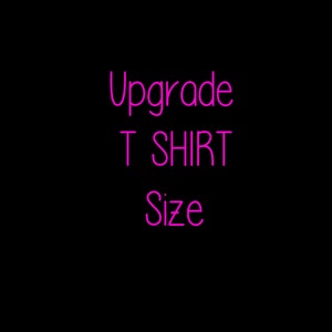 May include: Pink text on a black background that reads "Upgrade T Shirt Size".