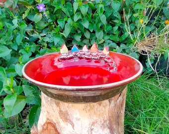 Baño para pájaros de cerámica con casita