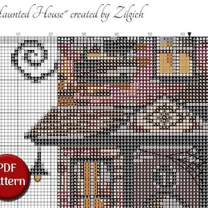 The image is a cross-stitch pattern depicting a house, with a large house in the center and smaller houses surrounding it. The pattern includes a variety of colors and shapes, creating a visually interesting and detailed design.