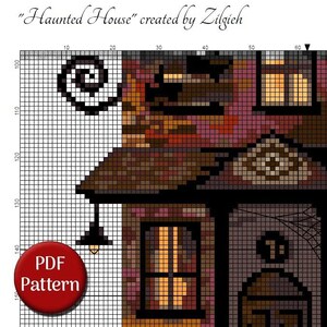 The image is a cross-stitch pattern depicting a house, with a spiral design on the left side. The pattern is labeled as a "DOT Pattern" and is described as a "DOT Pattern" in the image.