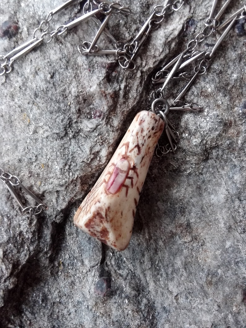 Chain pendant with Netsuke-style inlays