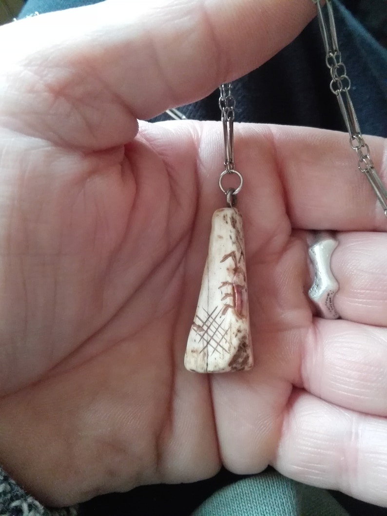 Chain pendant with Netsuke-style inlays