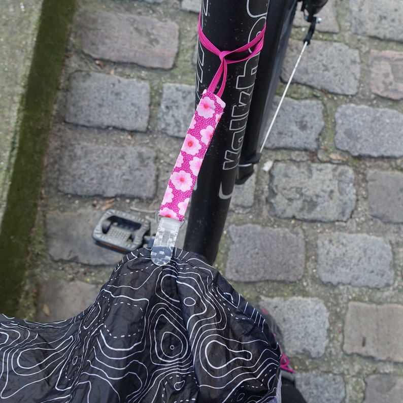 Pince pour la jupe ou la cape de pluie pour le vélo image 10