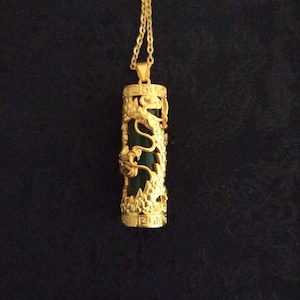 18 K Gold Dragon totem cylinder natural Green Jade pendant. .925 sterling silver in 18k solid gold. Green Jade Dragon pendant.