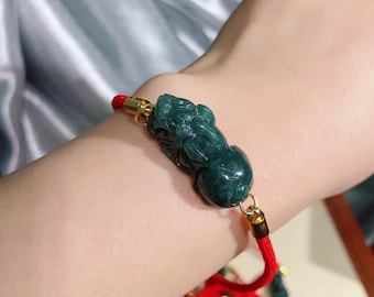 Hand Carved Jadeite (蓝水翡翠）  Pixiu Bracelet: 14 k Gold Filled Red String