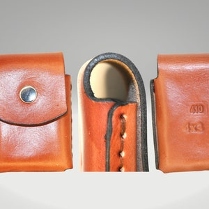 Bolsa de bolsillo de cuero de 3 pulgadas 410 para 4 rondas. No para cinturón.