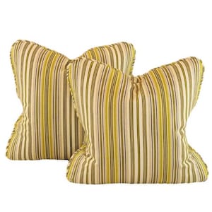 May include: Two decorative throw pillows with a striped pattern in shades of green, brown, and white.