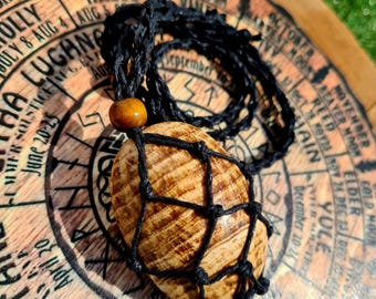 Brown Aragonite Palmstone 50mm, Peru, palmstone in cage, removable pendant, Peruvian Aragonite
