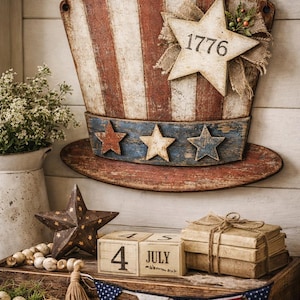 May include: A rustic patriotic display featuring a large Uncle Sam hat with red and white stripes, a star with "1776", and wooden stars. Includes a wooden tray with a star, wooden blocks reading "4 JULY", and a small American flag banner.