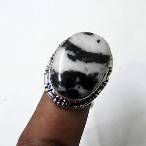 White Buffalo Turquoise Ring: Oval Gemstone, 925 Sterling Silver, Adjustable