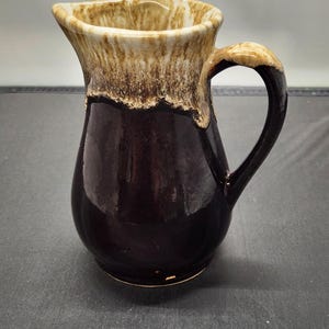 Brown Roseville drip ware pottery pitcher