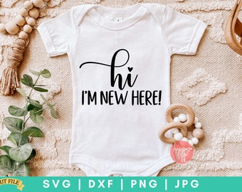 May include: White baby onesie with black text that reads "hi I'm new here!"