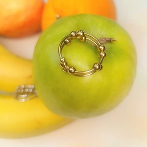 Antistress Ring mit beweglichen Kügelchen Fidget Angstring ADHS Fummelring Gold