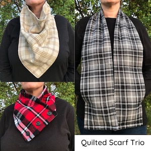 May include: Three quilted scarves in different plaid patterns: tan and white, black and white, and red and black.  The scarves are all made of soft, warm fabric and are perfect for keeping you cozy in the cold weather.  Quilted Scarf Trio