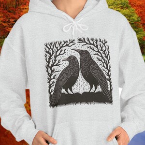 Raven linoprint cottagecore hoodie Black crow folk art sweatshirt Linocut blackbird nature lover gift for women Outdoor bird shirt for her