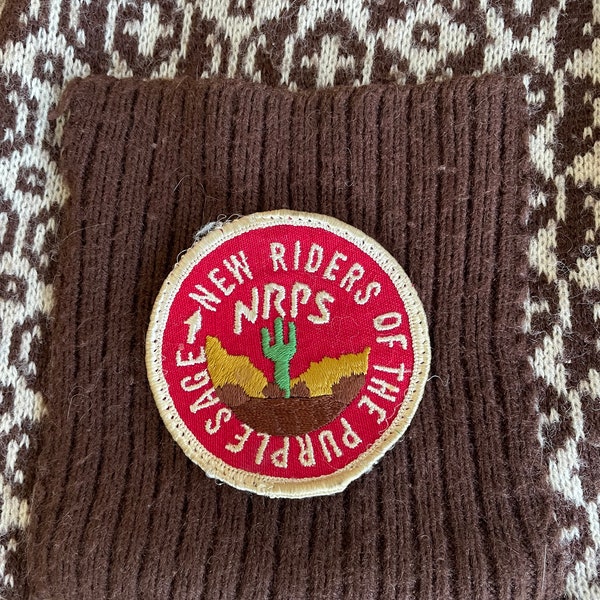 Vintage jaren '70 nieuwe renners van de paarse salie-patch