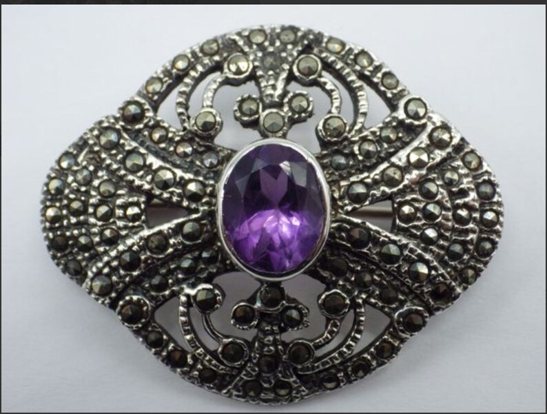 Vintage sterling and amethyst brooch