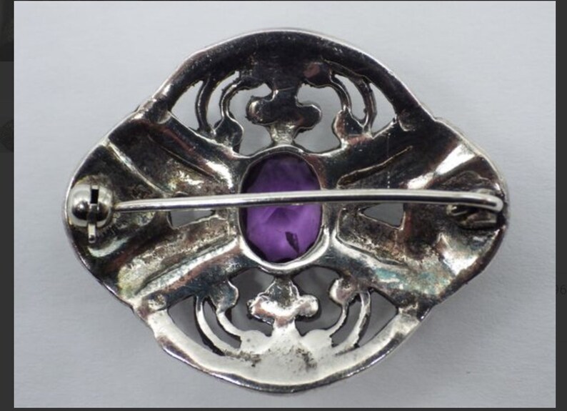 Vintage sterling and amethyst brooch