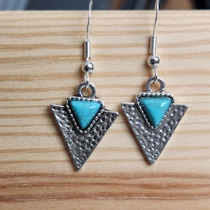 Geometric southwestern style with hammered metal and turquoise jewel