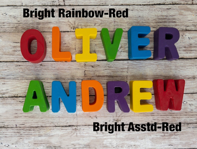 May include: The names OLIVER and ANDREW spelled out in colorful plastic letters. The letters are arranged in two rows. The top row is red, orange, yellow, green, blue, and purple. The bottom row is green, blue, orange, purple, yellow, and red. The text "Bright Rainbow-Red" is above the top row of letters. The text "Bright Assstd-Red" is below the bottom row of letters.