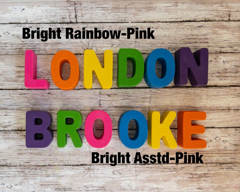 May include: The name "LONDON BROOKE" spelled out in colorful foam letters. The letters are arranged in two rows. The top row is "LONDON" in rainbow colors. The bottom row is "BROOKE" in purple, green, pink, blue, yellow, and pink.