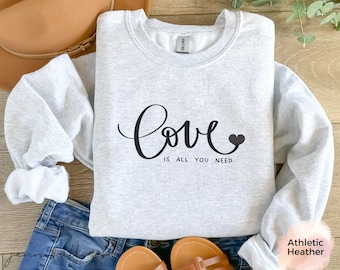 El amor es todo lo que necesitas – Sudadera con estampado de corazón, corte unisex
