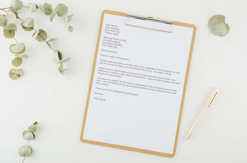 May include: A resignation letter on a clipboard with a gold pen. The letter is written on white paper with a brown border. The letter includes the subject line "Letter of Resignation".